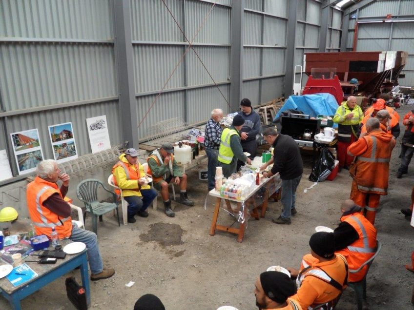 Lunch break inside our shed for all involved on Saturday - a welcome retreat from the weather. Photo: Glenn Fitzgerald