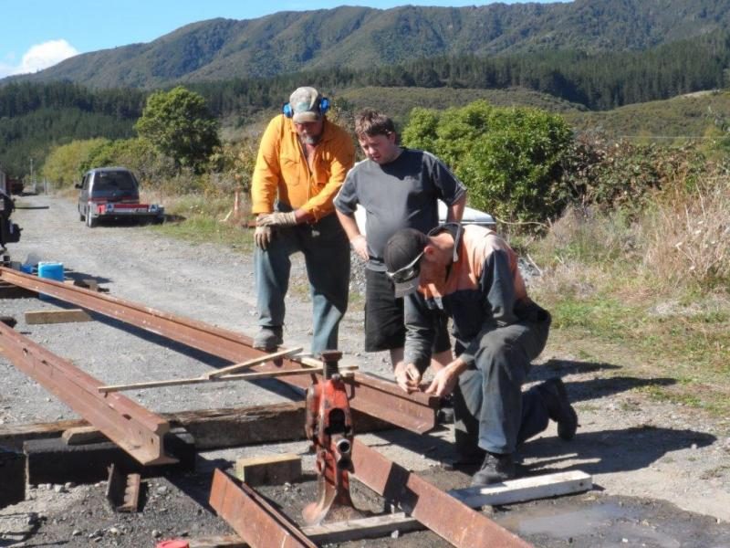 Hugh marking up 50kg rail for cutting and drilling on 5 April. Photo: Glenn Fitzgerald