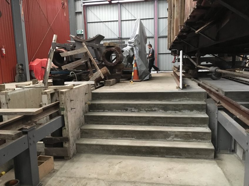 Concrete steps leading into the inspection pits at Upper Hutt end of the shed