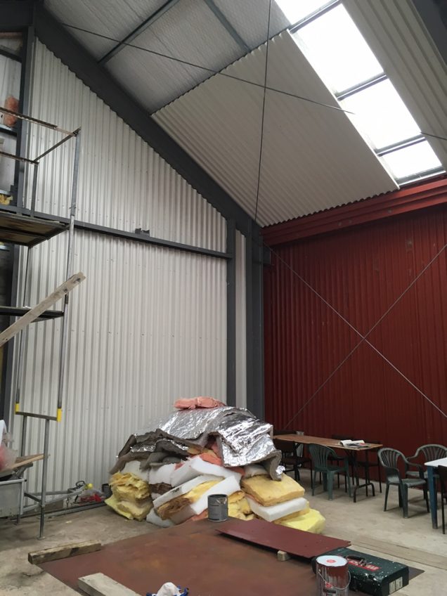 ColorSteel lining on half of an end wall, and ceiling of workshop