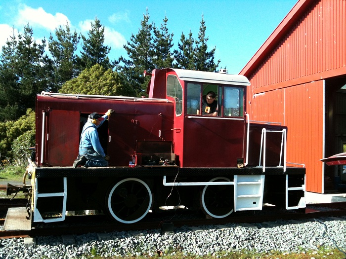 Tr189 tests - Glenn checking batteries and Ben at controls