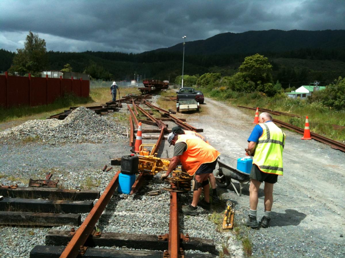 Lionel, Peter, John and Colin working on double slip and road 2 turnout on Saturday 24 November.