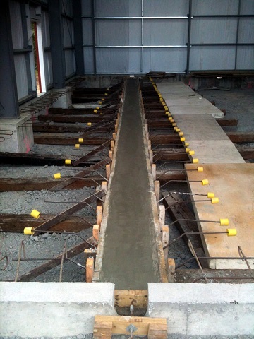 Rail beam concrete placed