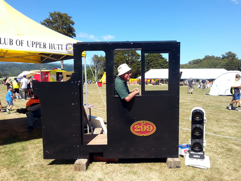 WGB tries out the driver's seat of steam loco Wb 299.