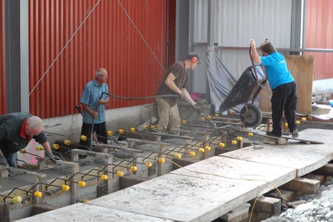 pouring concrete rail beam in the workshop