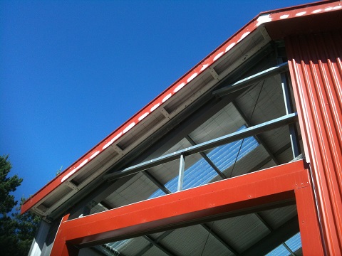 detail of soffit and wall framing above train door