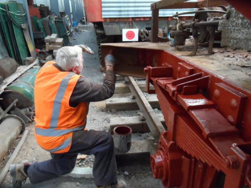 Trust member Ron Jones busy with painting ballast wagon Yc825