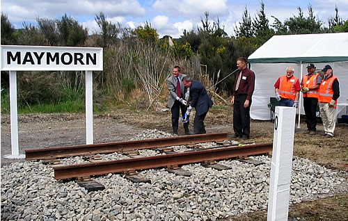 Hon. Paul Swain, Major Wayne Guppy turn first sod of the Rimutaka Incline Railway project. 