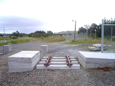 track in position at crossing for future loop.