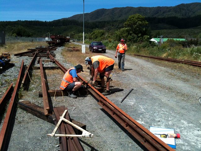 John, Colin and Glenn working on the running rails of the road 2 turnout on 1 December 2012.