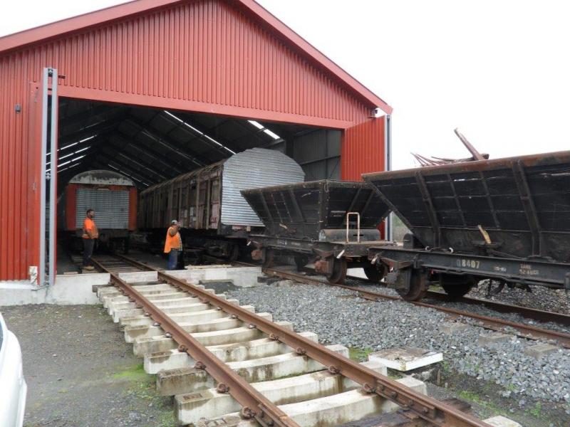 Sleeping carrriage Aa1060 makes a brief appearance outside the rail vehicle shed during track rearrangement work.