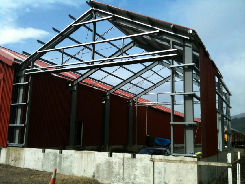 Workshop frame with portion of roof cladding on, 8 February 2014.