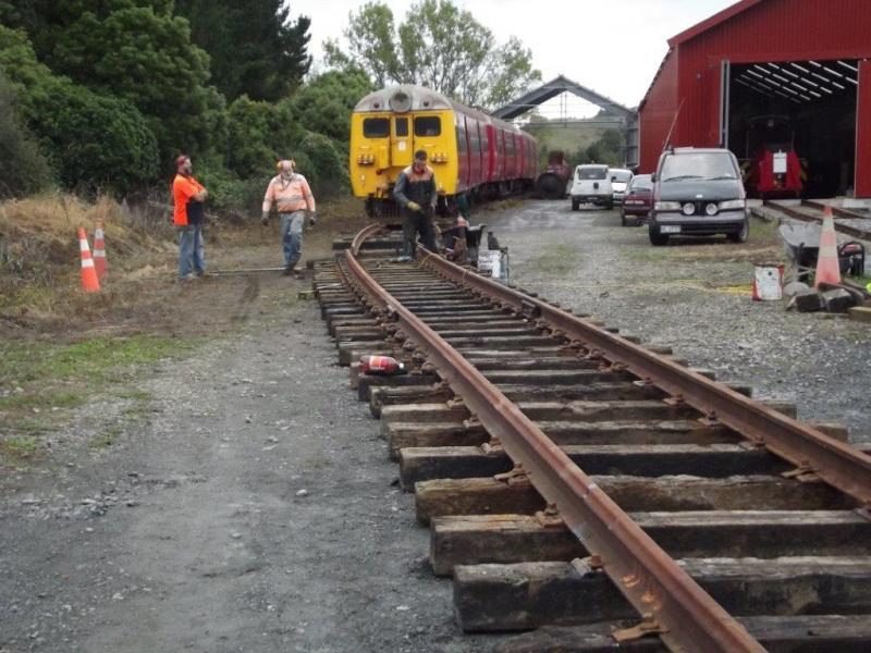 Two tracksets nearing completion on 12 April, the relocated boilers in distance near the workshop. Photo: Glenn Fitzgerald