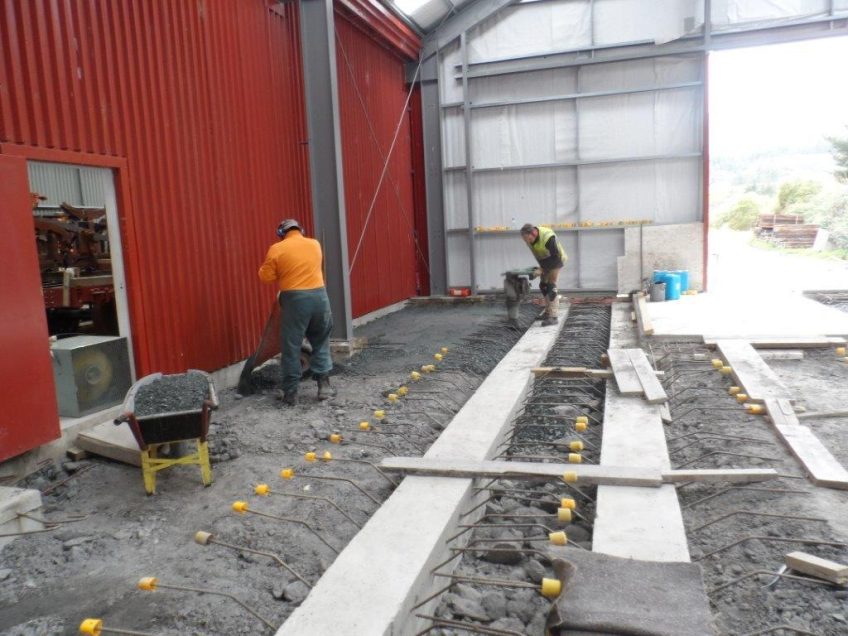 Colin and Hugh backfilling workshop floor