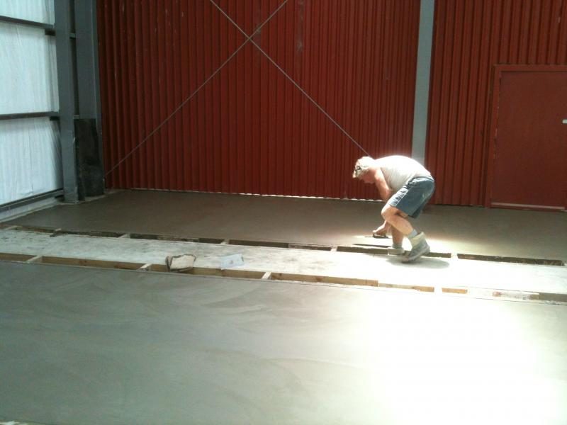 John de Graaff finishing up main floor slabs on Saturday 19 December 2015.