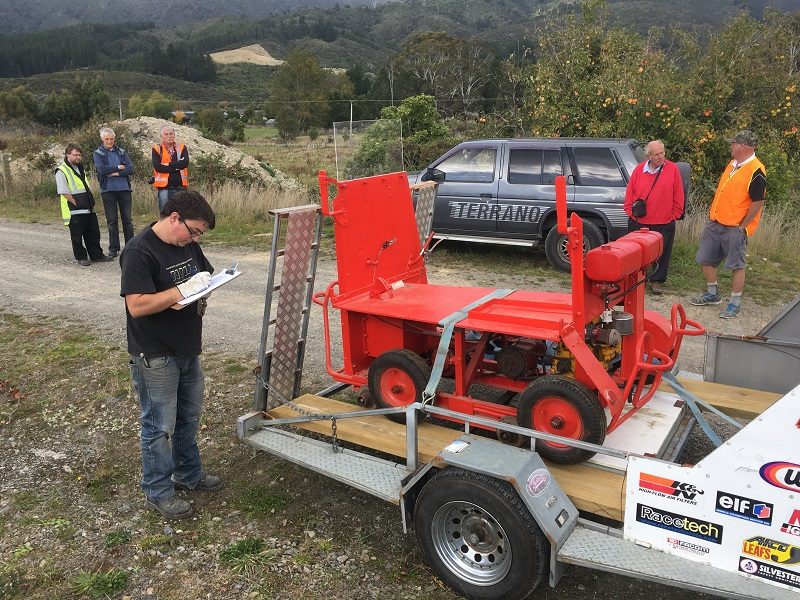 Ben Calcott inspecting the trolley before operation