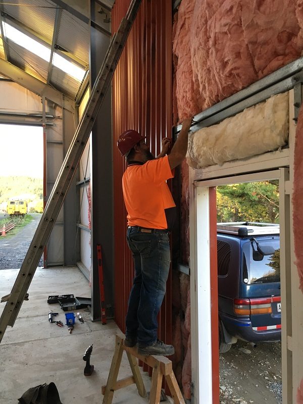Ray working on the internal lining of the workshop on 7 May