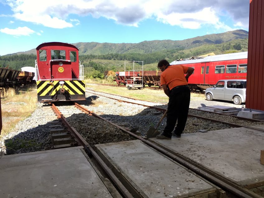 Ray tidying up ballast on shed road 1