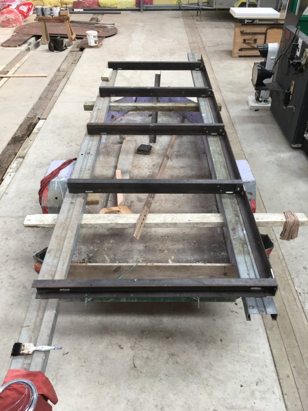 Frame members laid out for welding