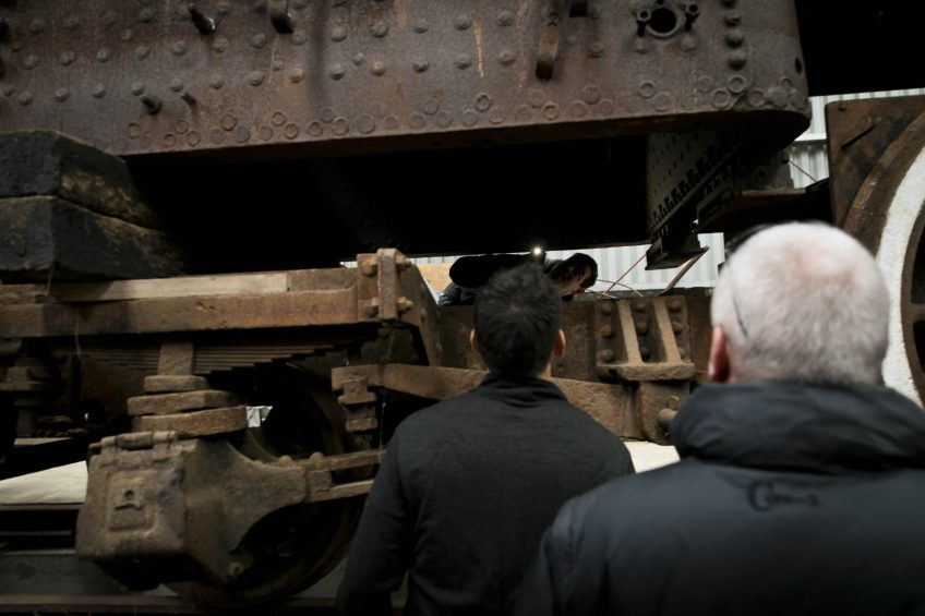 Checking out the firebox of the boiler on steam locomotive Ab 745