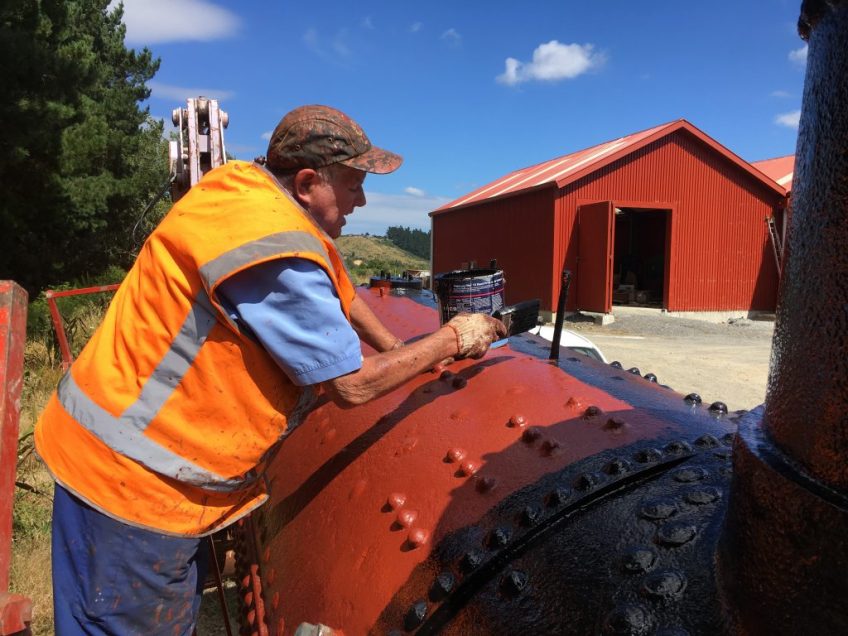 Ron Jones painting firebox top of Wb 299 boiler