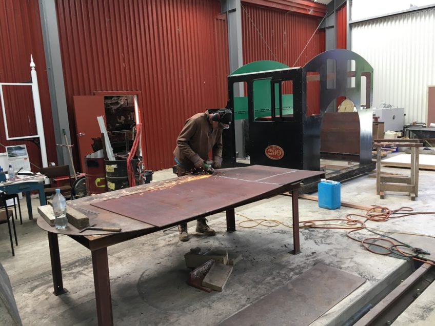 Hugh McCracken preparing bunker from spare steel sheet 