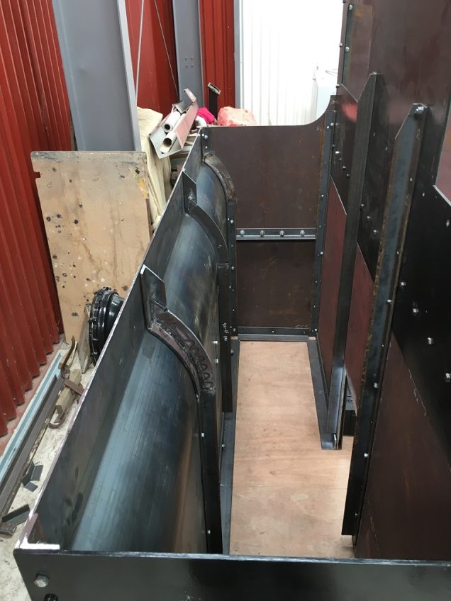 Coal bunker supporting frame, fitted to the back of the cab.